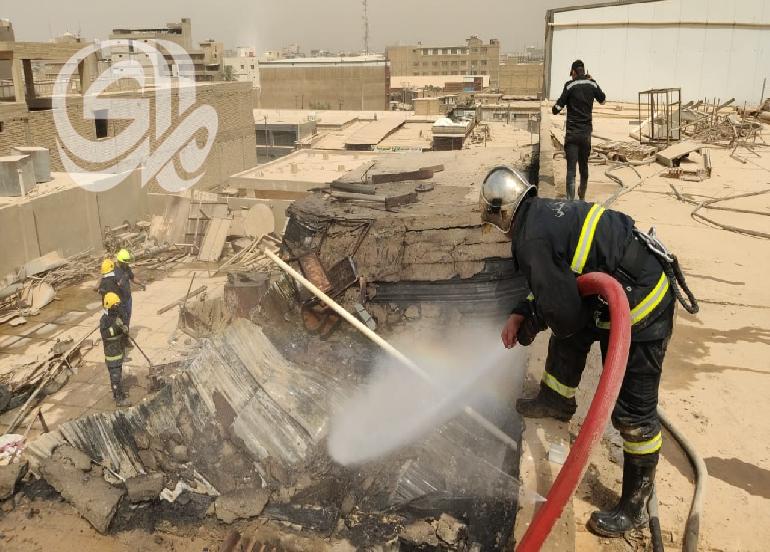 إخماد حريق اندلع في سطح بناية متهالكة وسط بغداد
