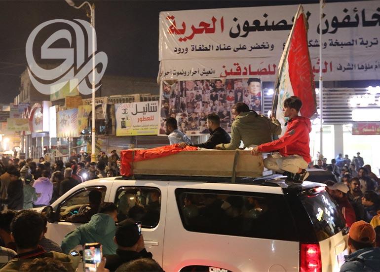 تظاهرات ومصادمات في الناصرية احتجاجاً على اعتقال أشخاص متهمين بتمزيق صور مر