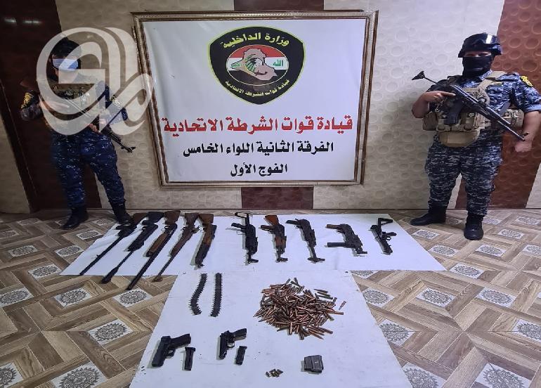 ضبط اسلحة غير مرخصة بعملية تفتيش في مدينة الشعلة ببغداد