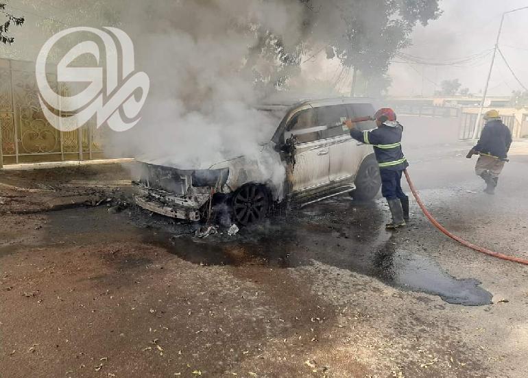 بالصور.. (تماس كهربائي) يشعل النيران داخل سيارة في بغداد